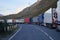 Several kilometres long line of Trucks by the side of the Georgian military highway near Kazbegi