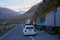 Several kilometres long line of Trucks by the side of the Georgian military highway near Kazbegi