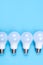 Several LED bulb on blue background. Saving energy concept.