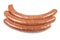 Several merguez on a white background