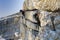 Several mountain climbers on an exposed Via Ferrata in the Dolomites of Italy