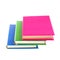 Several multicolored bright books on white background