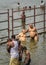 Several people bath ritually in Cauvery River.