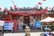 Several people wait their turn at the main entrance of the Trieu Chau Assembly Hall Temple enabled to vote in the XV parliamentary