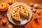 Several pieces of pumpkin cake with nuts on orange table, a traditional autumn dish for thanksgiving day and halloween