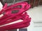 Several pink coat hangers