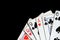 Several playing cards on a dark background c