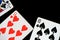 Several playing cards on a dark background c