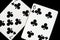 Several playing cards on a dark background c