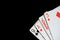 Several playing cards on a dark background c