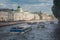 Several pleasure boats sailing on the Fontanka River on a spring day