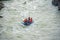 Several rafts and kayaks rafting on the mountain river Katun.