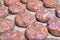 Several raw cutlets of beef and pork lie on a wooden Board