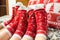 Several red xmas socks with human legs, Christmas ornament