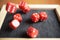 Several rolling red dice fall on special boardgame frame