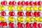 Several rows of blister packs with red and yellow capsules