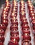 Several rows of red buddhist prayer candle