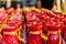 Several rows of red buddhist prayer candles