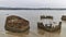 Several rusting Wrecks of boats lie abandoned on Sao Tome Island where the Previous Owners just ran them on to the Beach.