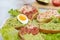 Several sandwiches with avocado, tomato and egg, sandwiches on a