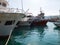 Several ships moored in the harbor dock