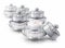 Several silver deluxe cosmetic jar on white