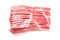 Several slices of raw bacon