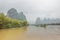 Several small boats at Xingpingzhen fishing village