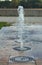 Several small ground fountains in one line