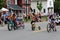 Several smiling children on bikes riding through town at annual All Things Oz parade, Chittenango, New York, 2018