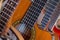 Several spanish guitars at a music studio.