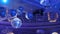 Several sparkling disco balls spinning with flashing lights during music band performance or dancing party. Party lights