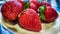 Several strawberries on a plate