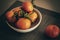 Several tangerines on a plate, before eating