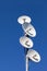 Several telecommunications antennas of a cellular network and wireless internet against a blue sky. Receiving and