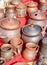 Several types of clay pottery pots at the fair