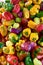 Several types of peppers at display on a marketplace in Brazil