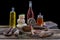 Several variety of traditional Corsican delicatessen and cheese on black background.