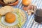 Several vegan cheeses on wooden table .