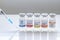 Several vials vaccine bottles of covid-19 immunization popular vaccines brands in the