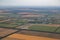 Several villages, a river, fields sown with wheat from a bird`s eye view
