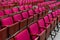 several wooden and red velvet chairs from the concert hall at Coliseu dos recreios in Lisbon