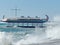 A severe storm on the Yalta embankment. The ship `Argo` on the waterfront. It is stylized as Greek ships