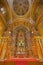 Seville - The main altar and presbytery of baroque church Iglesia de Buen Suceso from 17. cent.