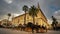 Seville, Spain - February 7th, 2020 - Parked horse-drawn carriages in front of the General Archive of the Indies in Seville City