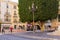 Seville, Spain, January 11, 2019 - A square with beautiful facades of houses and a huge ficus tree trimmed in the form of a cube