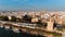 SEVILLE/SPAIN-March 3,2019:Aerial view of Guadalkivir river in Sevilla,Andalucia,Spain.Torre del Oro,military watchtower.Teatro de