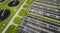 Sewage farm. Static aerial photo looking down onto the clarifying tanks and green grass. Geometric background texture.