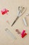 Sewing accessories in red and pink tones