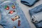 Sewing beautiful patches to jeans